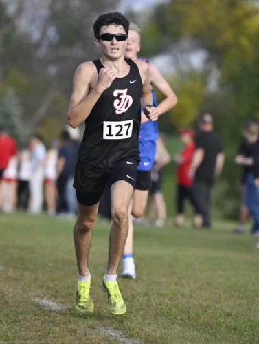 Boys run at Algona